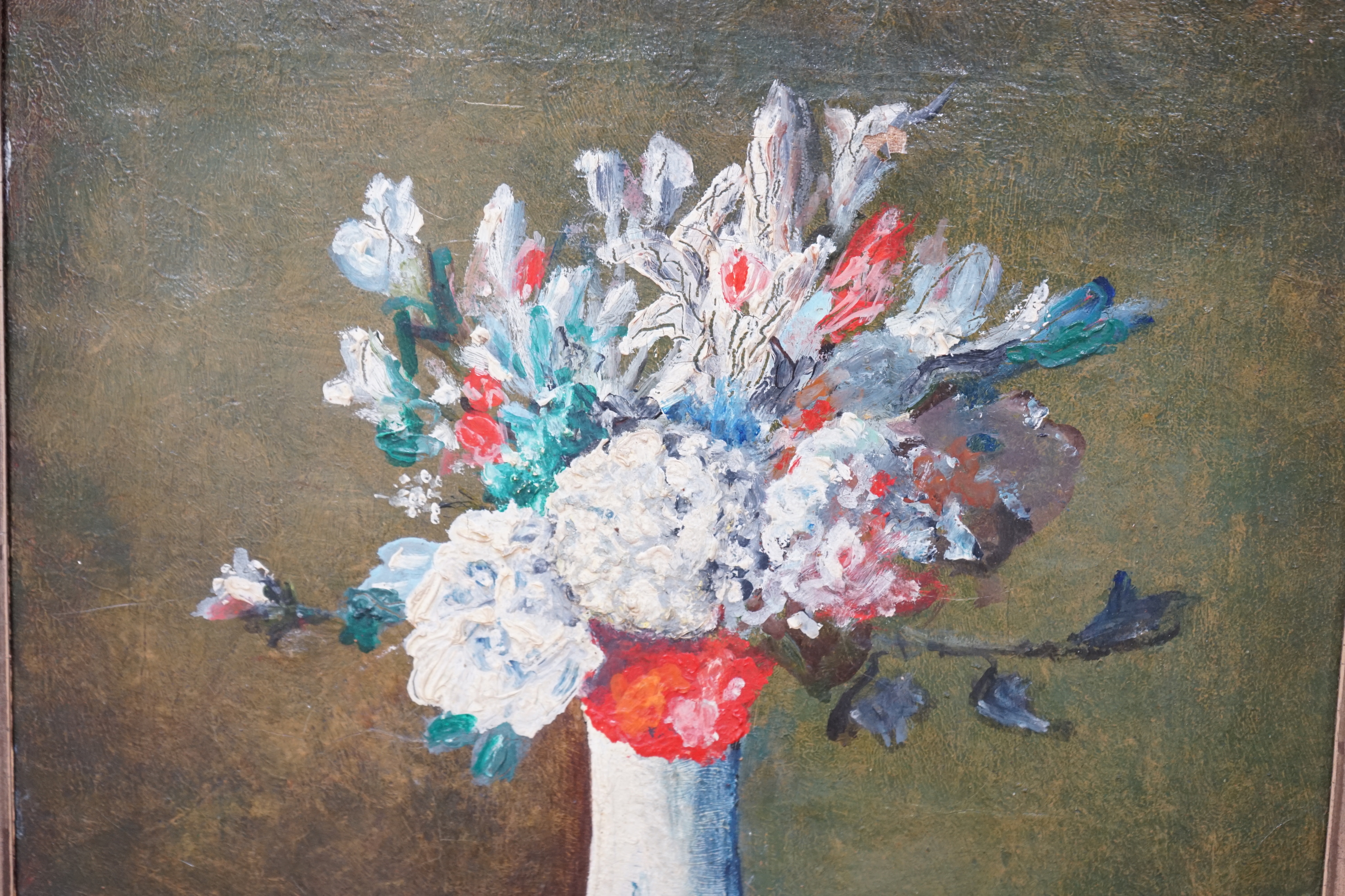 German School c.1990, oil on canvas, Still life of flowers in a Delft vase, indistinctly monogrammed lower right, 45 x 29cm